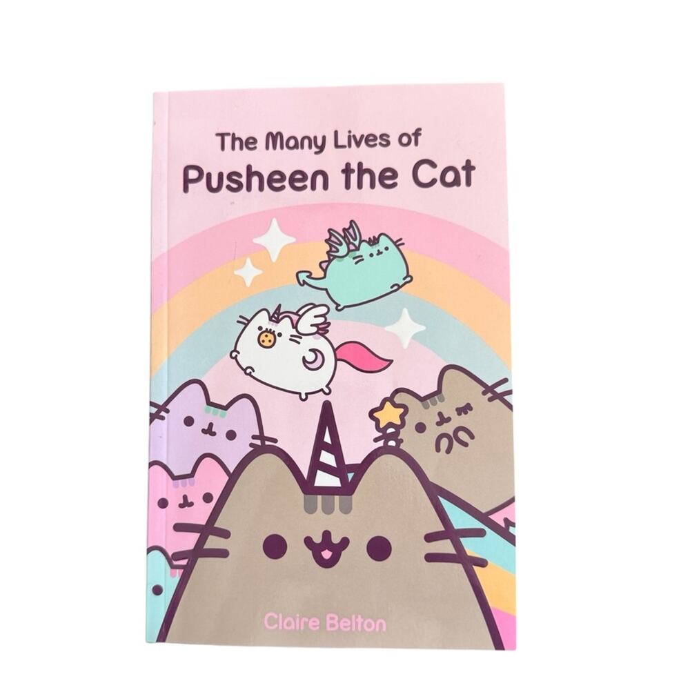 The Many Lives of Pusheen the Cat Paperback Book By Claire Belton
